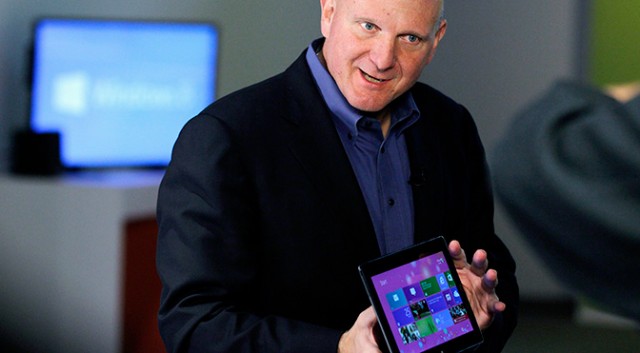 Steve Ballmer, with a Windows 8 tablet