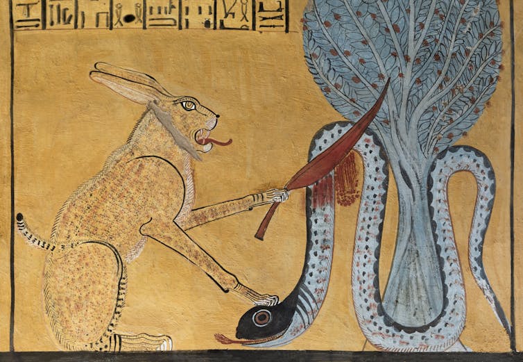 Detail from Egyptian tomb showing great cat of Re killing the giant snake Apep (Apophis).